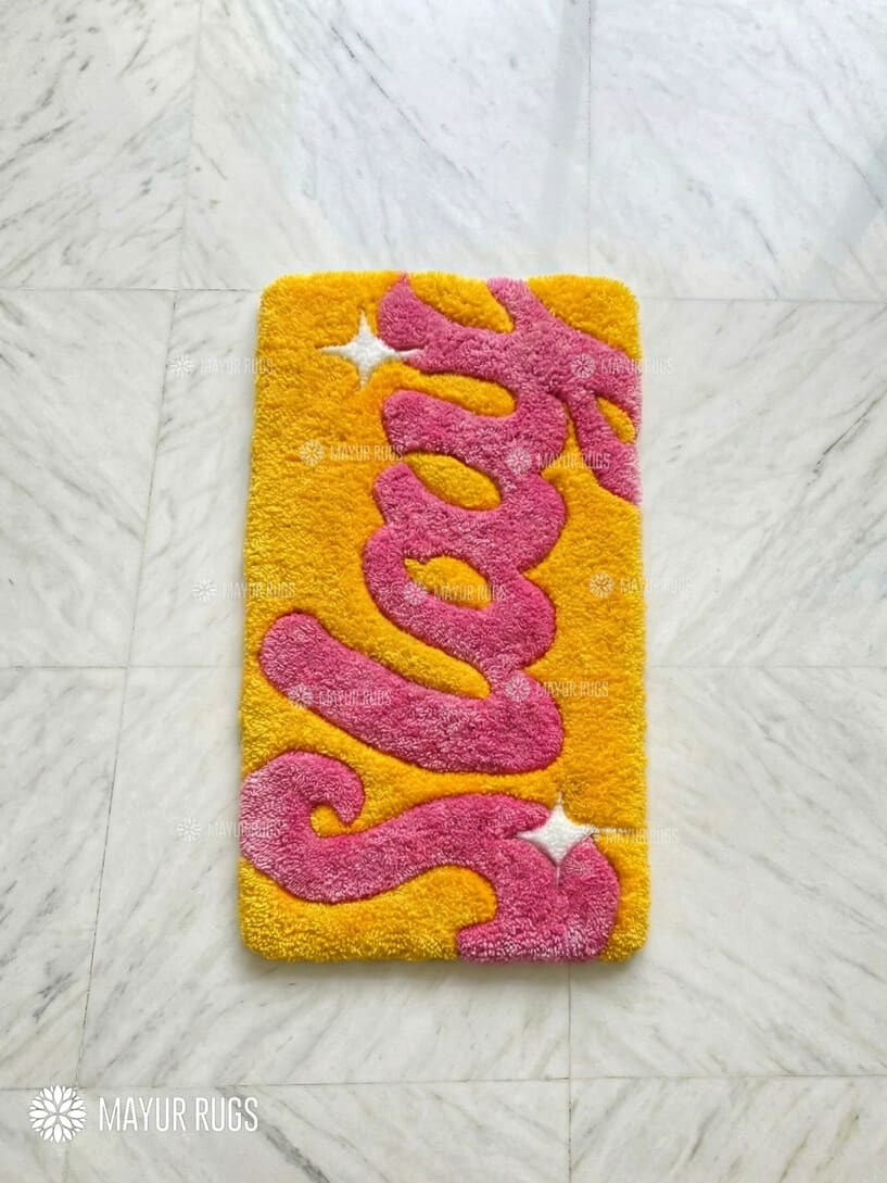 SLAY statement handmade wool rug with bold typography design, modern premium area rug by Mayur Rugs