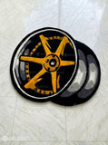 Alloy wheel inspired handtufted handmade wool rug with automotive design, premium custom area rug by Mayur Rugs