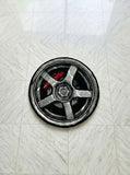 Shop Car Wheel Handmade Rugs by Mayur Rugs. Crafted from premium New Zealand wool with bold automotive design and custom sizing—perfect for car enthusiasts and modern spaces.