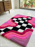 Pink checkerboard handmade wool rug with modern aesthetic design, premium custom area rug by Mayur Rugs