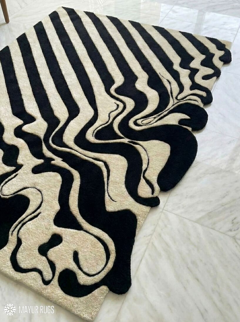 Melting liquid abstract hand-tufted wool rug with drip effect silhouette, premium custom area rug by Mayur Rugs