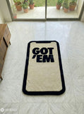 Got ’Em iPhone inspired hand-tufted wool rug with bold digital typography design, premium custom area rug by Mayur Rugs