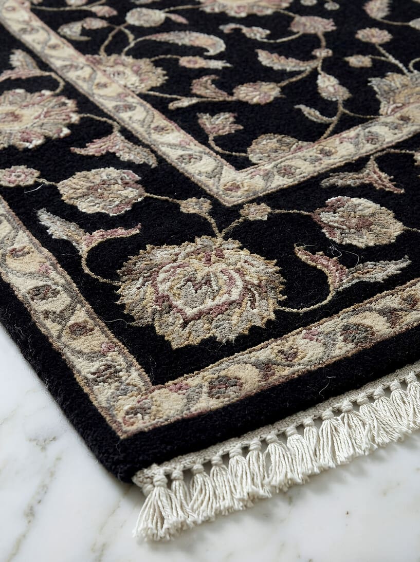 Black traditional wool and silk hand-knotted rug with intricate heritage pattern, premium luxury rug by Mayur Rugs