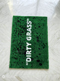 Dirty grass typography hand-tufted wool rug with green textured design, premium custom area rug by Mayur Rugs