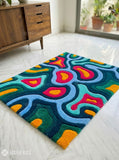 Abstract neon flow hand tufted wool rug featuring colorful contemporary wave patterns by Mayur Rugs