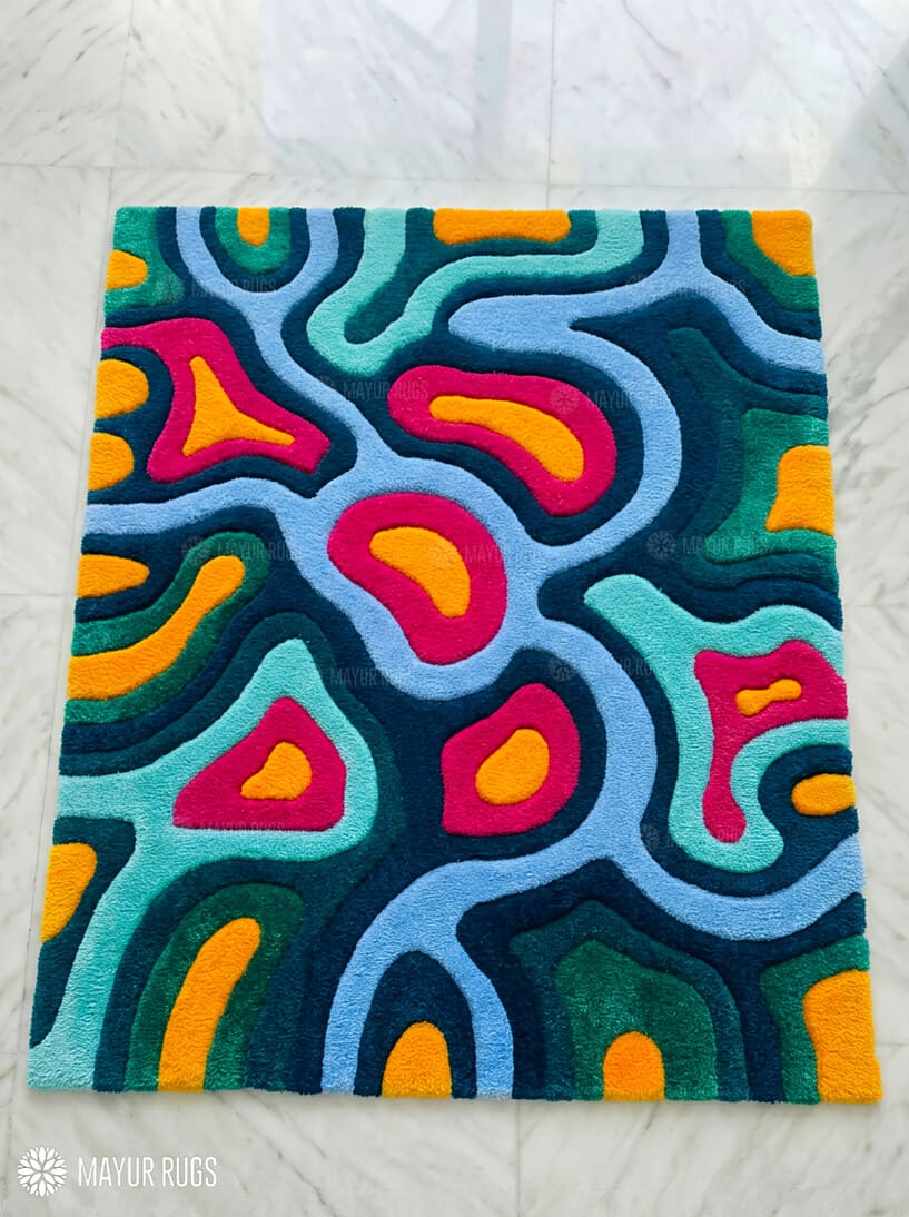 Colorful abstract rug with wavy patterns on a white background