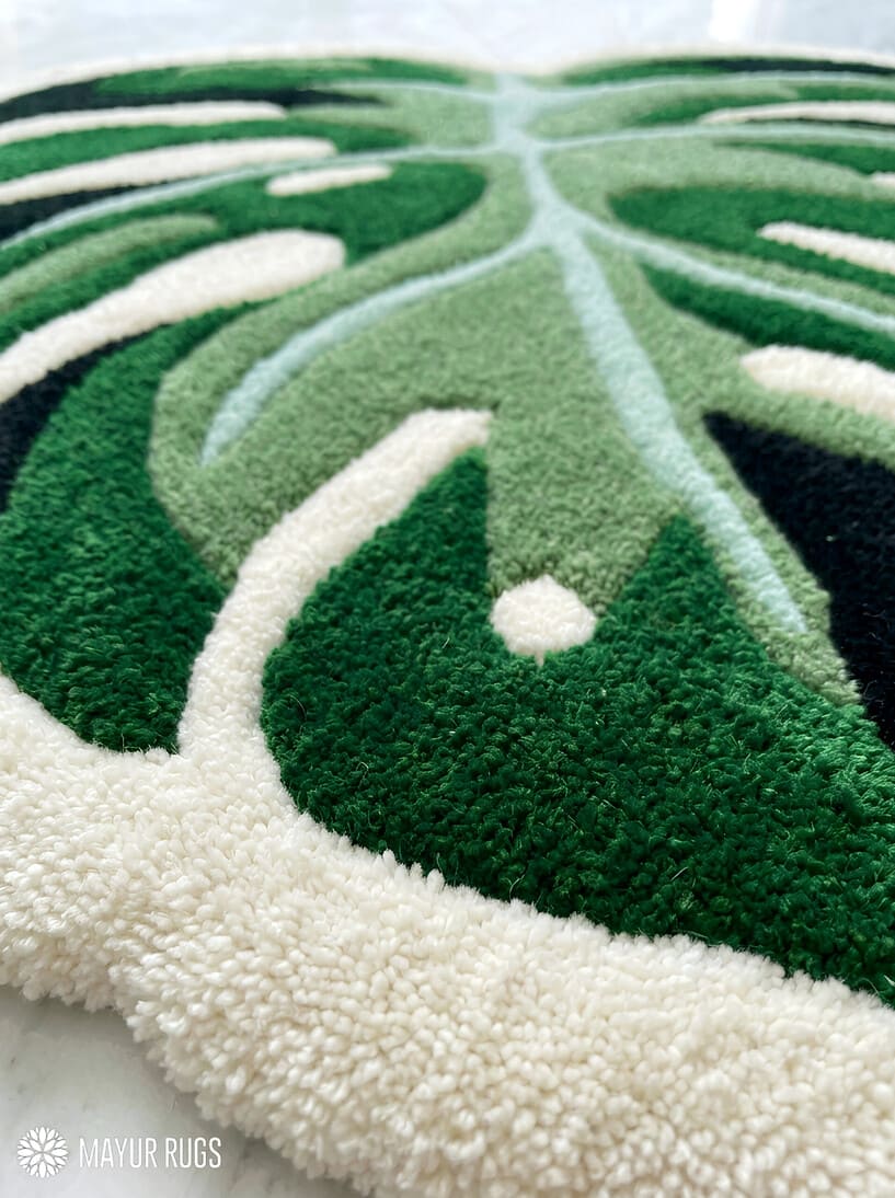 Green monstera leaf hand-tufted wool rug with tropical botanical design, premium custom area rug by Mayur Rugs