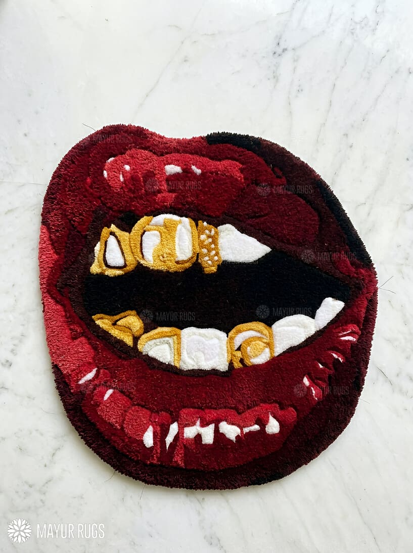 Red lips gold grill hand tufted wool art rug featuring luxury street art design by Mayur Rugs