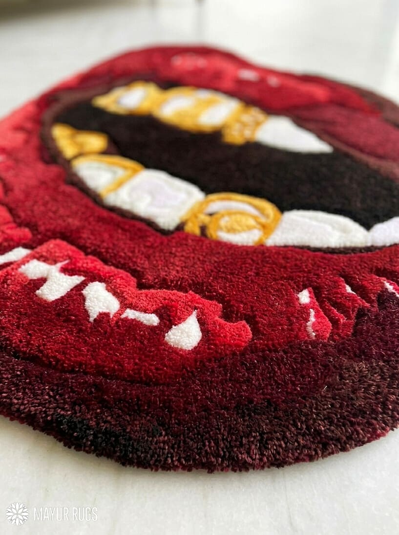 Red lips gold grill hand tufted wool art rug featuring luxury street art design by Mayur Rugs