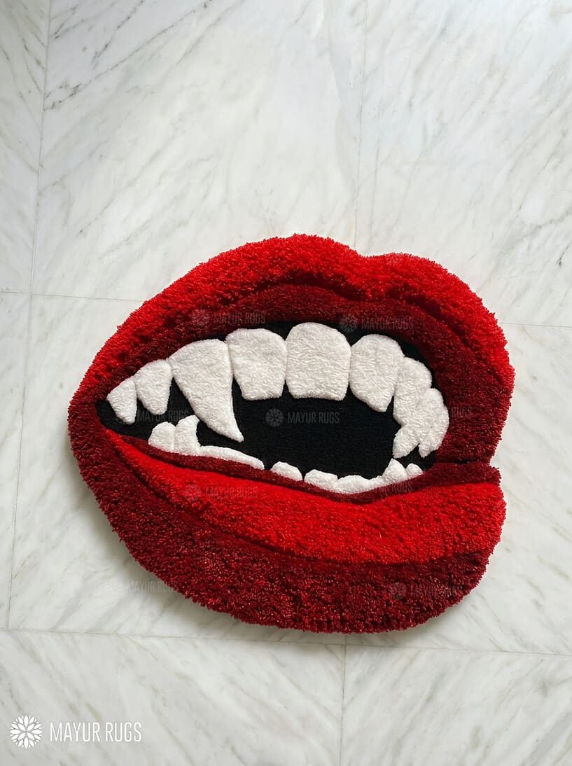 Vampire fangs lips hand tufted wool rug featuring gothic statement art design by Mayur Rugs