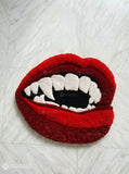 Vampire fangs lips hand tufted wool rug featuring gothic statement art design by Mayur Rugs