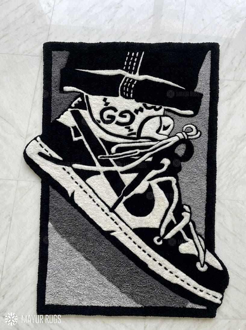 High-top sneaker hand-tufted wool rug featuring monochrome streetwear-inspired footwear artwork by Mayur Rugs