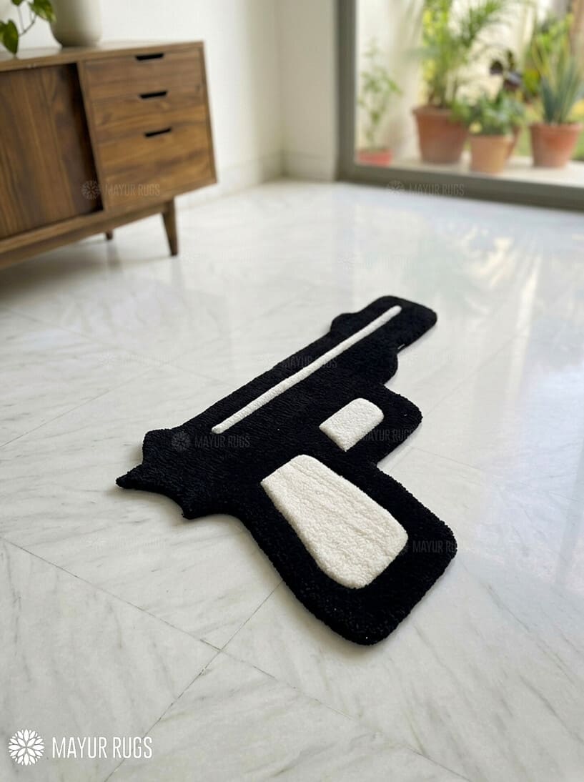 Pistol graphic hand-tufted wool rug with bold urban statement design, premium custom area rug by Mayur Rugs