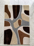 Earth tone abstract hand-tufted wool rug featuring organic modern shapes in brown, beige, ivory, and grey by Mayur Rugs