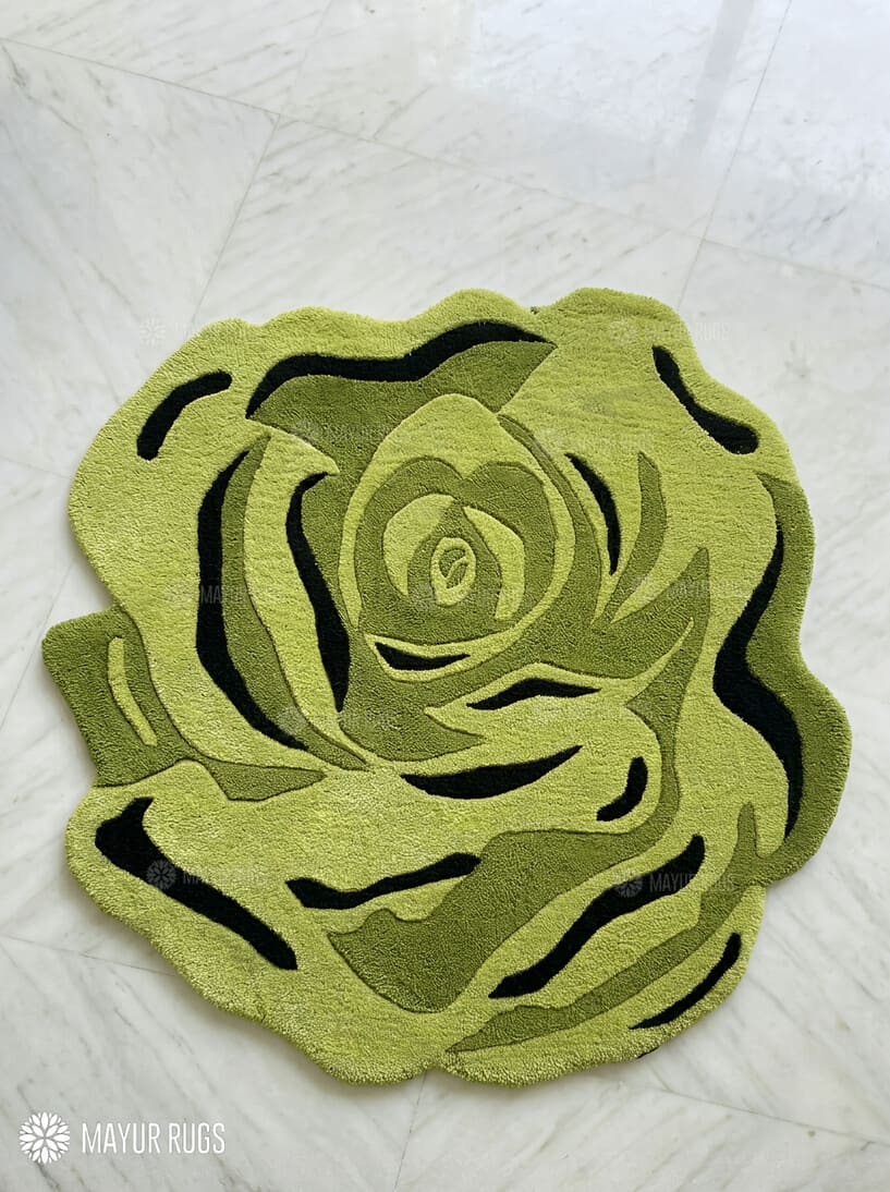 Sage green rose shaped hand-tufted wool rug with layered botanical floral detailing by Mayur Rugs