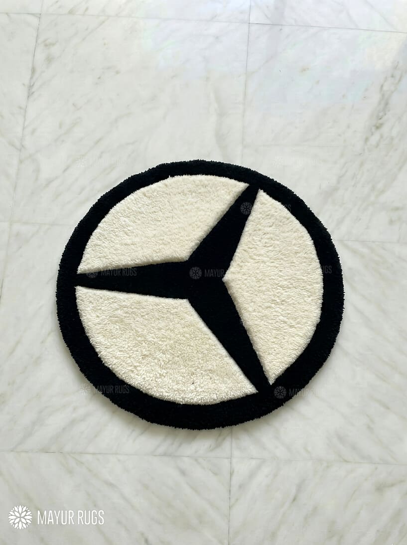 Mercedes logo inspired custom hand-tufted wool rug with luxury automotive aesthetic design by Mayur Rugs