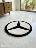 Mercedes logo inspired custom hand-tufted wool rug with luxury automotive aesthetic design by Mayur Rugs