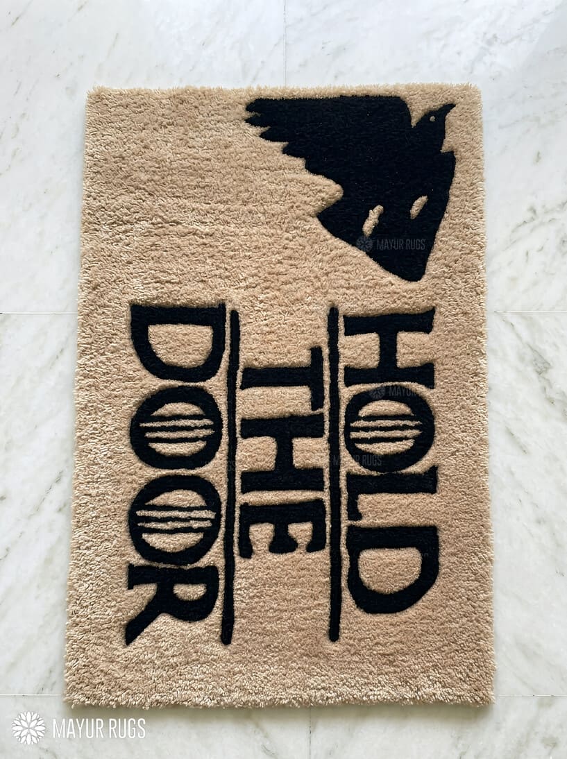GOT Hold The Door hand-tufted wool rug with fantasy monochrome typography aesthetic design by Mayur Rugs