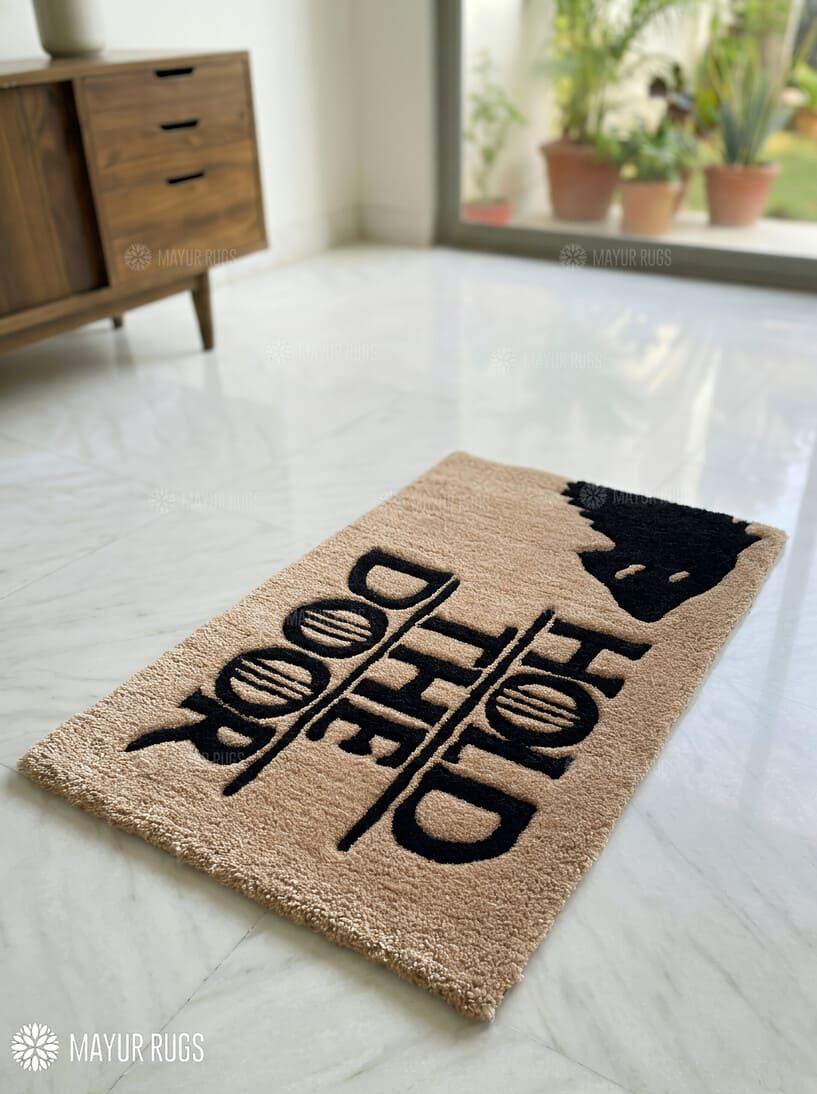GOT Hold The Door hand-tufted wool rug with fantasy monochrome typography aesthetic design by Mayur Rugs