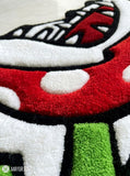 close up Piranha plant inspired hand-tufted wool rug with retro gaming cartoon design, premium custom area rug by Mayur Rugs