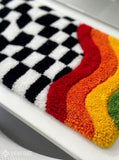 Wavy checkerboard abstract keyboard hand-tufted wool rug with retro optical gaming setup aesthetic design by Mayur Rugs