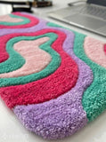 Candy wave abstract keyboard hand-tufted wool rug with pastel fluffy desk setup aesthetic by Mayur Rugs