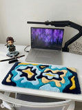 Ocean-inspired abstract hand-tufted keyboard rug featuring layered blue and cream flowing artwork for desk setups by Mayur Rugs