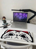 Sleepy cartoon cat face hand tufted keyboard rug with kawaii aesthetic by Mayur Rugs