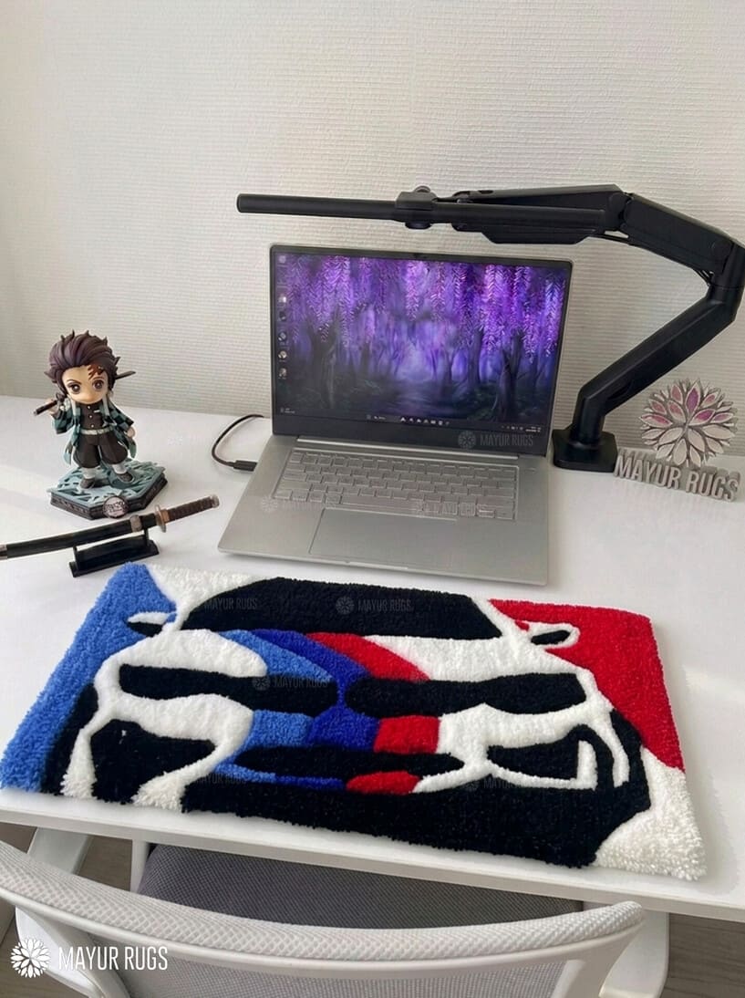 BMW M Inspired hand-tufted keyboard rug with luxury automotive gaming desk setup aesthetic by Mayur Rugs