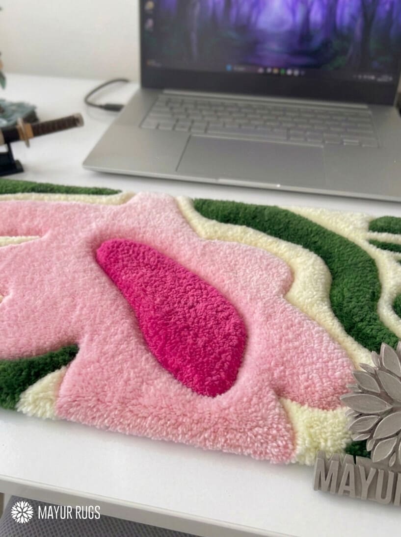 Pink floral botanical hand-tufted keyboard rug with green foliage design by Mayur Rugs