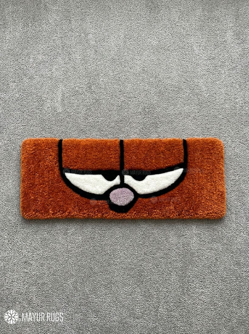 Brown retro cartoon face hand-tufted keyboard rug with sleepy eyes aesthetic by Mayur Rugs