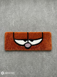 Brown retro cartoon face hand-tufted keyboard rug with sleepy eyes aesthetic by Mayur Rugs