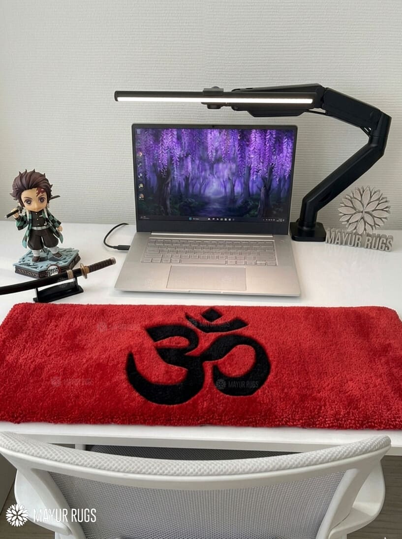 Om symbol hand-tufted keyboard rug with spiritual meditation aesthetic by Mayur Rugs
