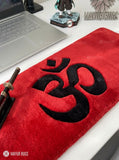 Om symbol hand-tufted keyboard rug with spiritual meditation aesthetic by Mayur Rugs
