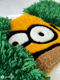 Homer Simpson bush meme inspired hand-tufted keyboard rug with fluffy green shag aesthetic by Mayur Rugs
