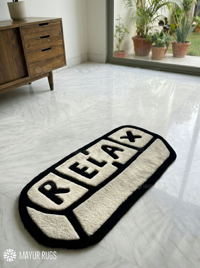 Relax pill-inspired hand-tufted wool rug with modern chill aesthetic and plush texture by Mayur Rugs