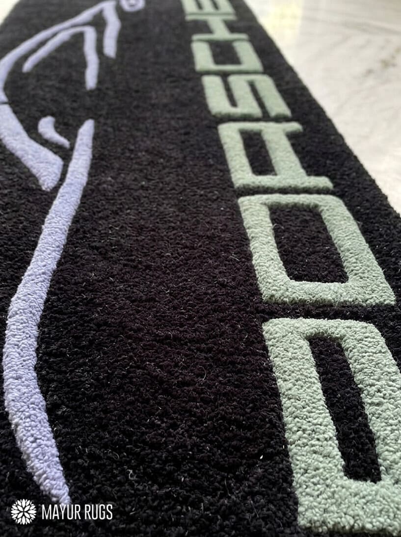 Porsche sports car silhouette hand-tufted wool rug with luxury automotive aesthetic by Mayur Rugs