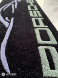 Porsche sports car silhouette hand-tufted wool rug with luxury automotive aesthetic by Mayur Rugs