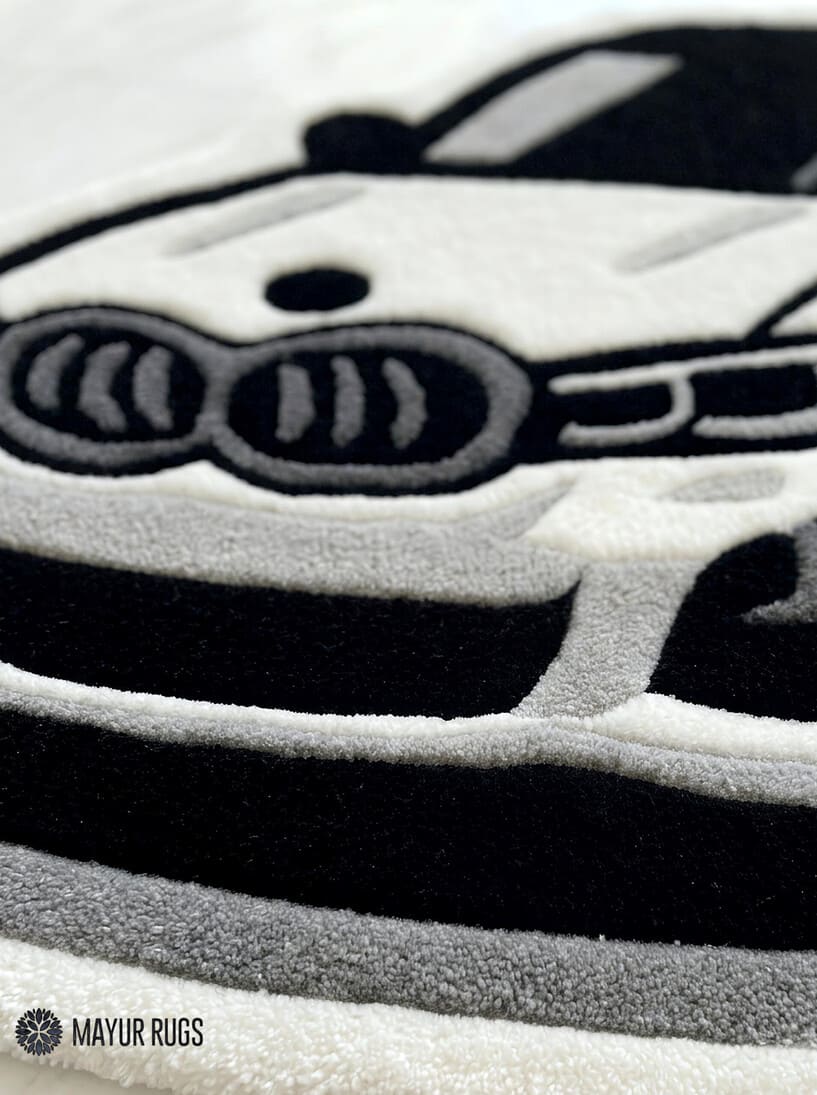 Luxury sports car inspired hand tufted wool rug featuring performance automotive artwork by Mayur Rugs