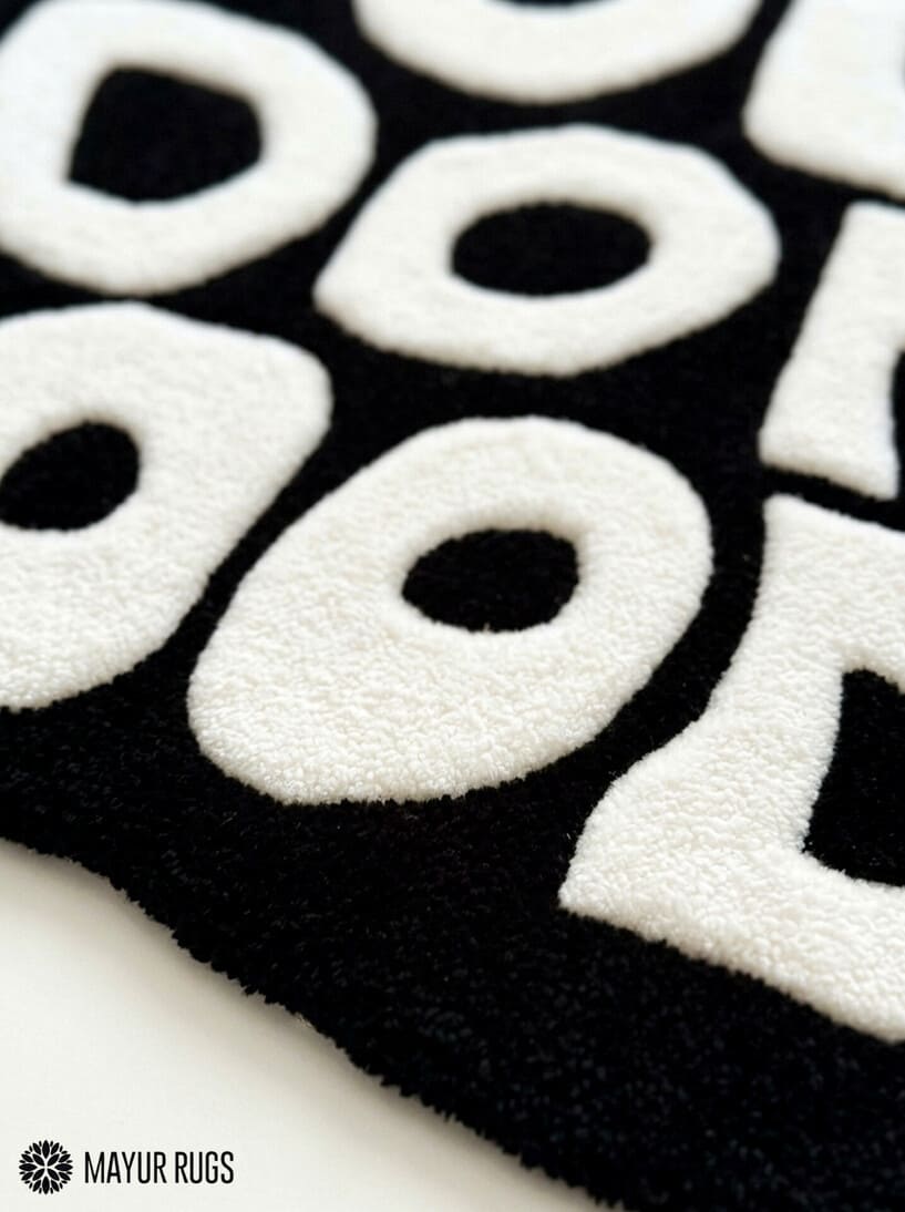 You Look Good typography hand-tufted wool rug with bold black and white affirmation design by Mayur Rugs