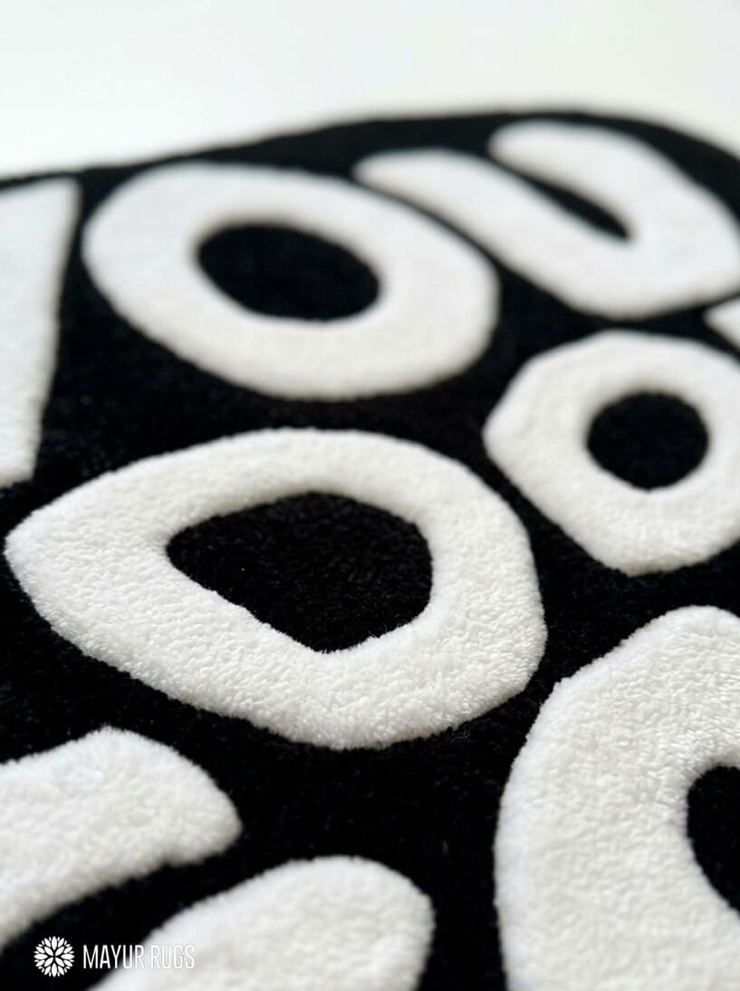 You Look Good typography hand-tufted wool rug with bold black and white affirmation design by Mayur Rugs