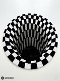 Handtufted black and white optical illusion vortex wool rug with checkerboard geometric design by Mayur Rugs