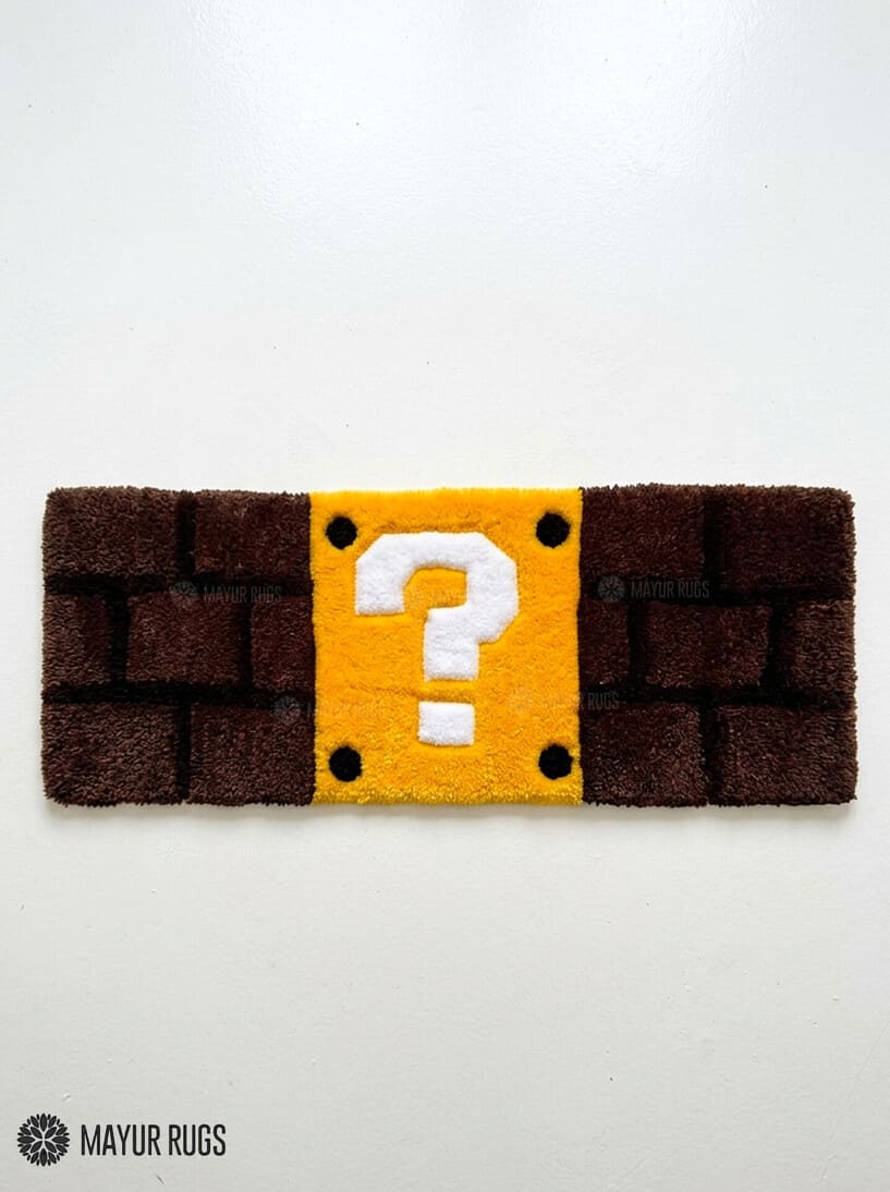 Shop Mario Question Block Keyboard Rugs by Mayur Rugs. Handmade using premium New Zealand wool with iconic retro gaming artwork and luxurious plush texture.