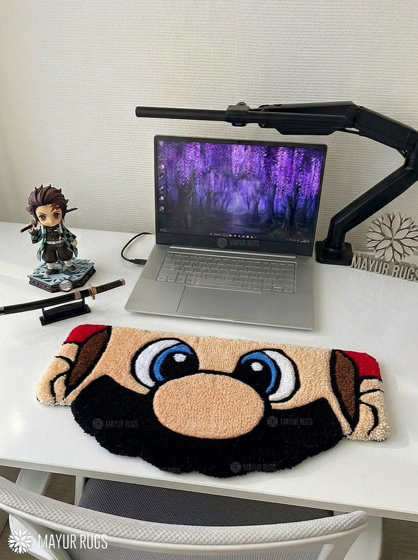 Mario inspired face hand tufted keyboard rug featuring iconic gaming character artwork by Mayur Rugs