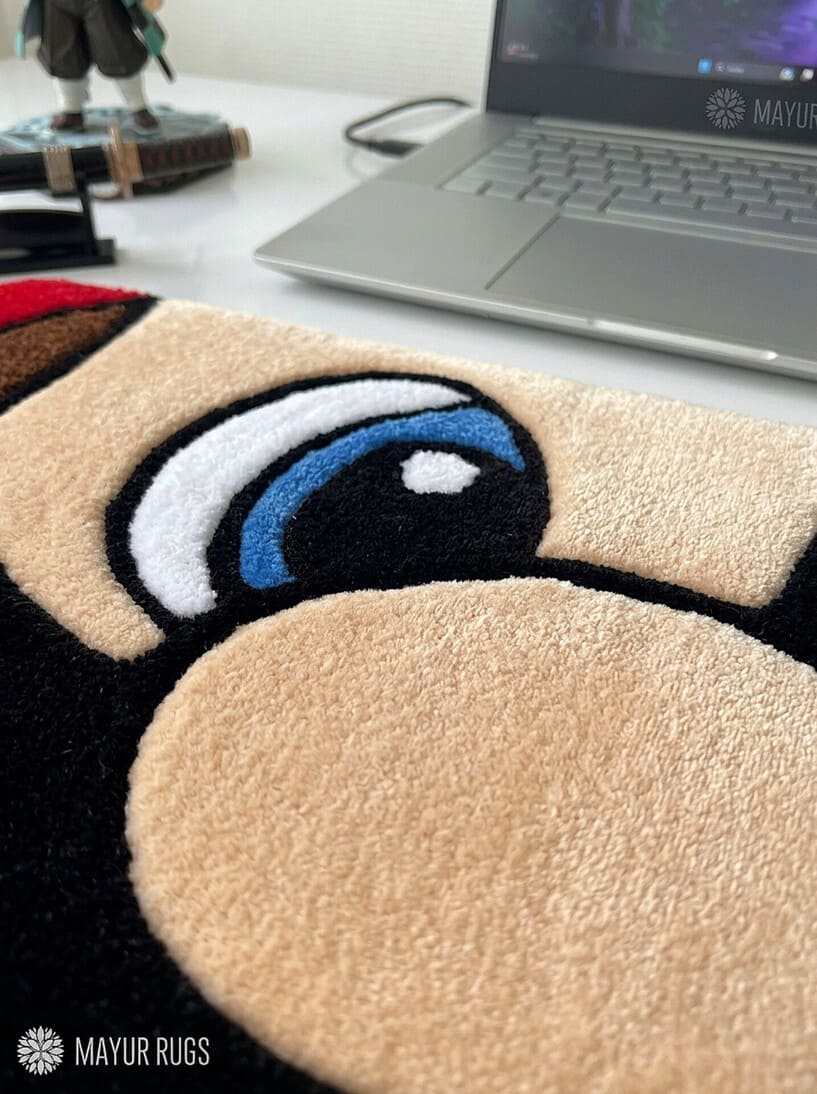 Mario inspired face hand tufted keyboard rug featuring iconic gaming character artwork by Mayur Rugs