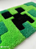 Minecraft Creeper inspired hand tufted keyboard rug featuring pixelated gaming artwork by Mayur Rugs