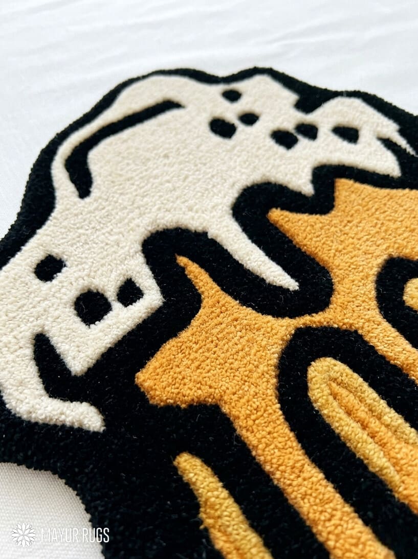 Beer stein hand tufted wool rug featuring overflowing foam and pub inspired artwork by Mayur Rugs