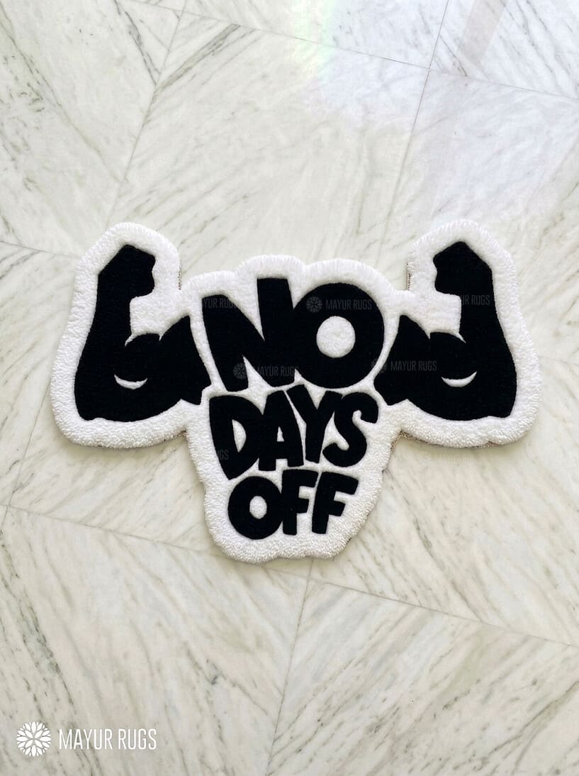 No Days Off hand tufted wool rug featuring motivational gym typography and flexing arm artwork by Mayur Rugs
