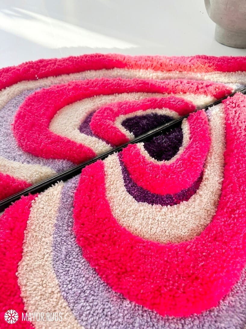Pink half heart loop and cut hand tufted 3D wool rug featuring layered heart pattern artwork by Mayur Rugs