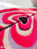 Pink half heart loop and cut hand tufted 3D wool rug featuring layered heart pattern artwork by Mayur Rugs